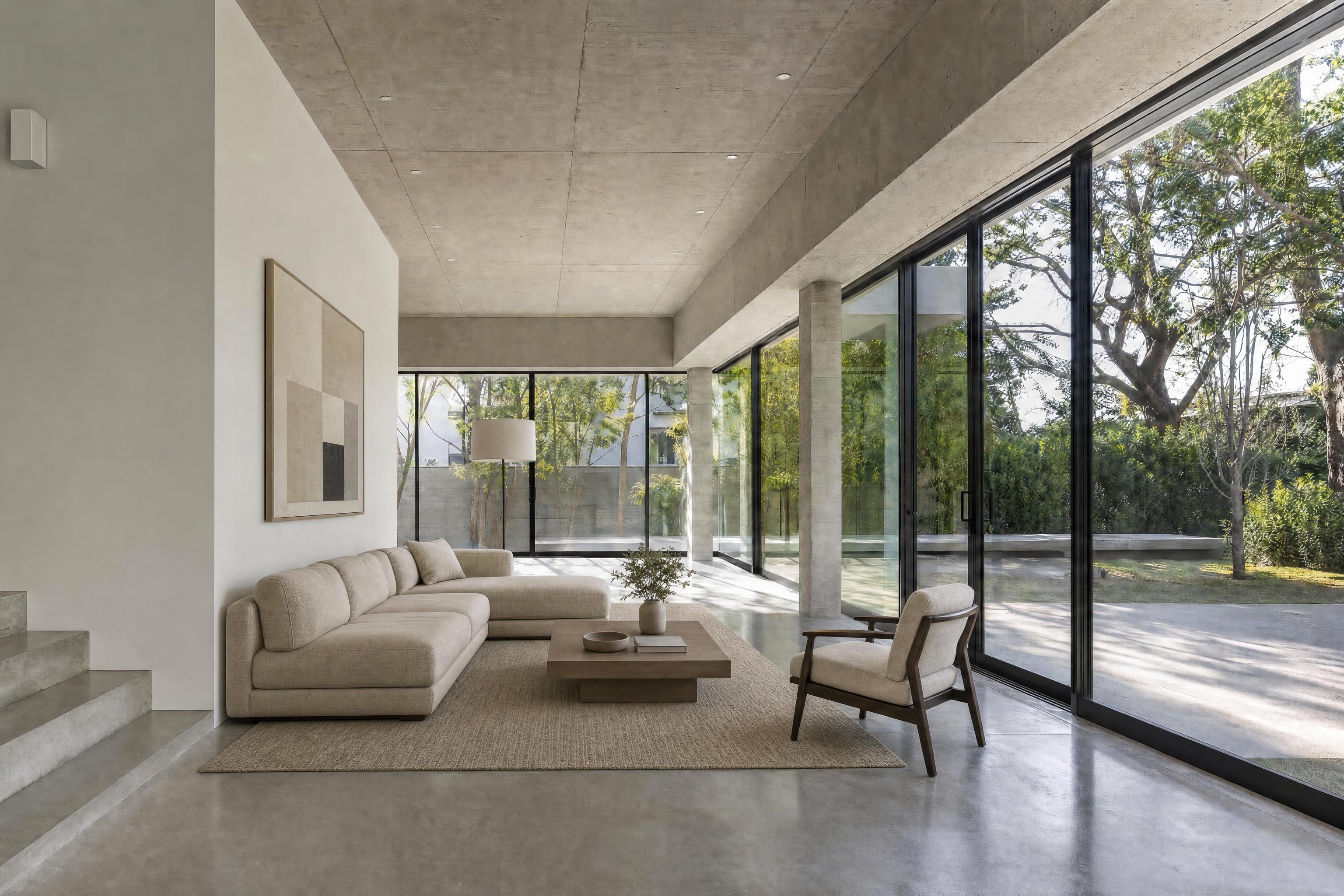 Living room in an architect-designed concrete house, virtually staged in a minimalist style