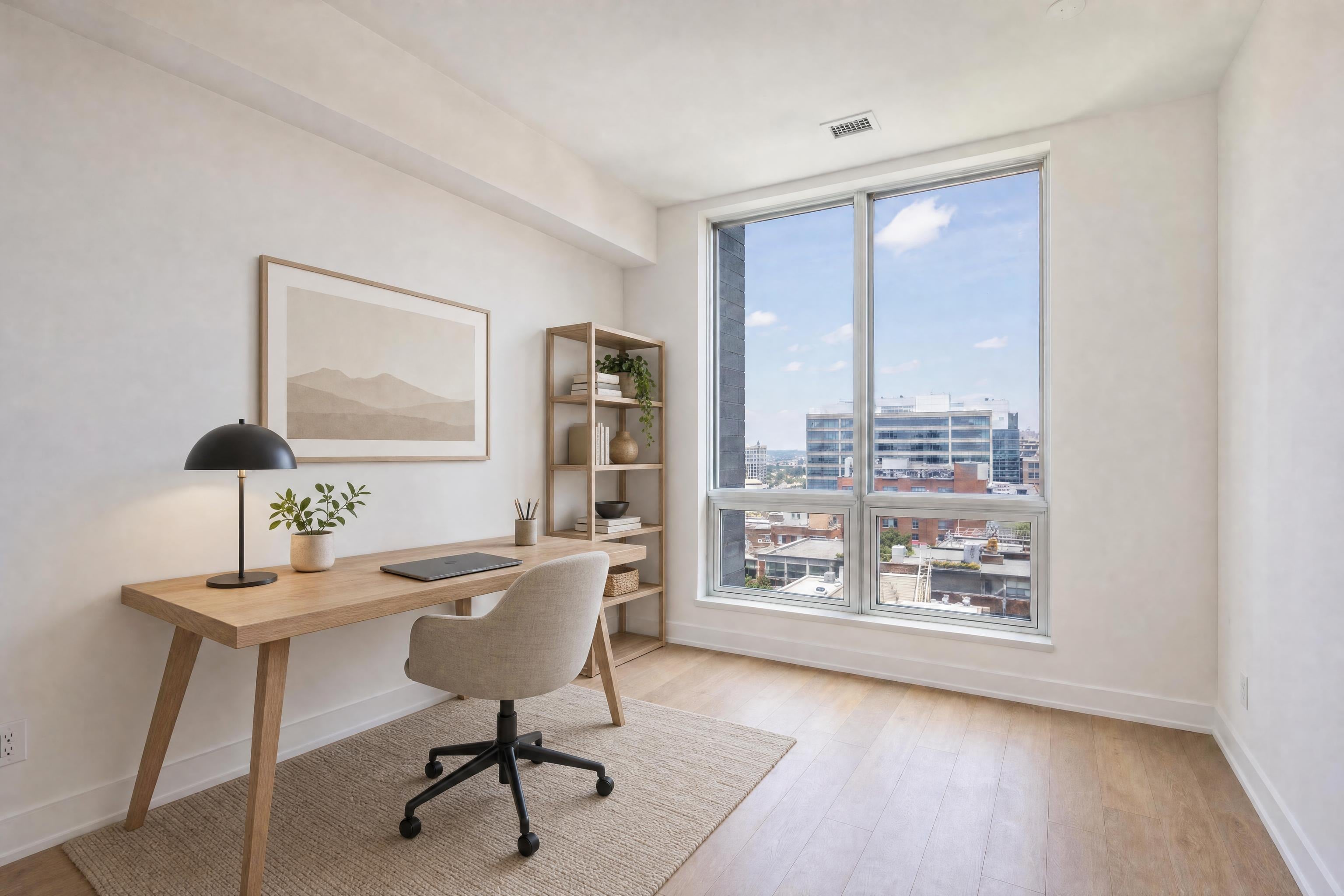 Small bedroom used as a home office in a new apartment, virtually staged in a Scandinavian style